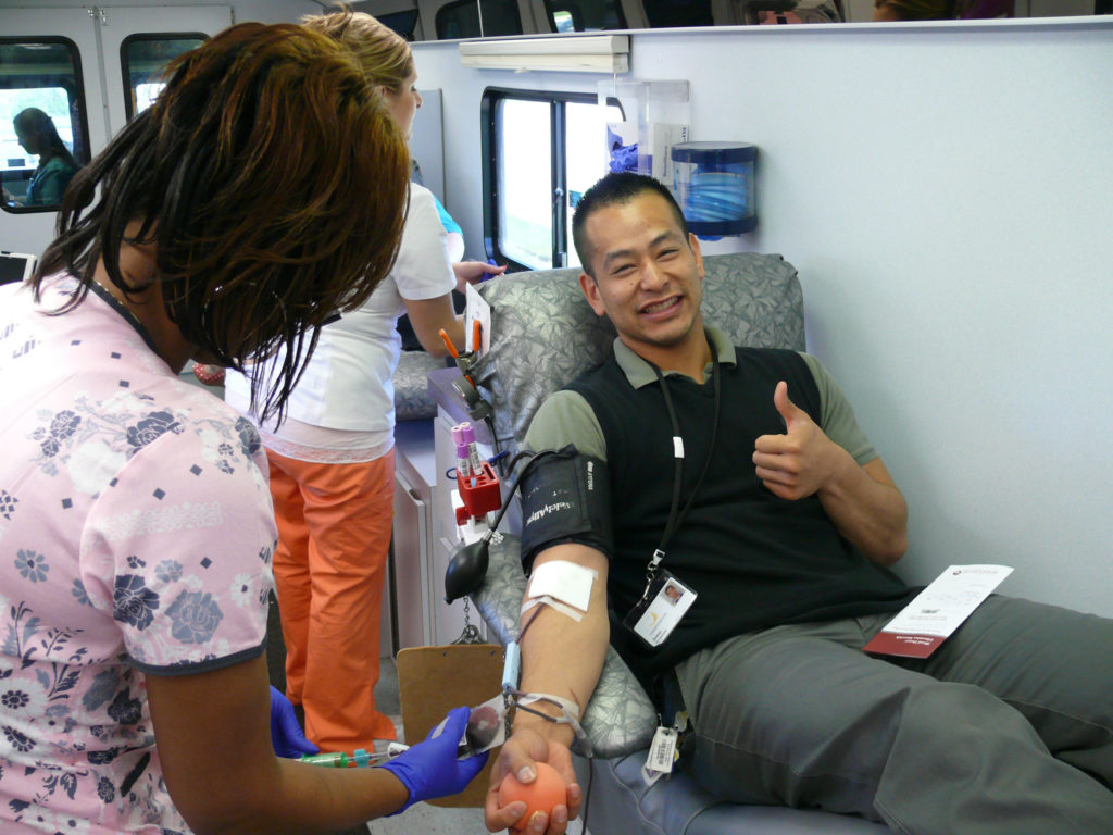 Rosecrance Berry Campus receptionist James Nachampassack donates blood Tuesday, May 7, 2013.
